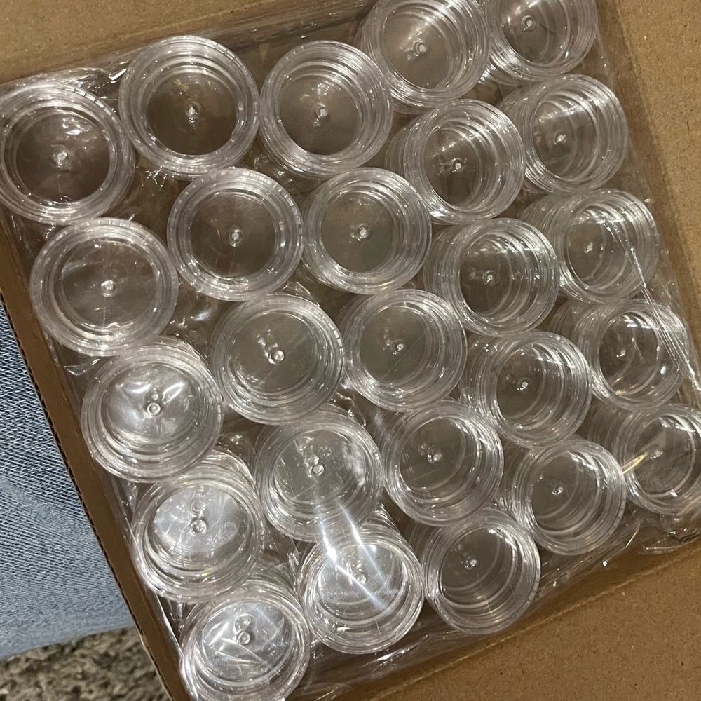 Small plastic containers for crafts or samples